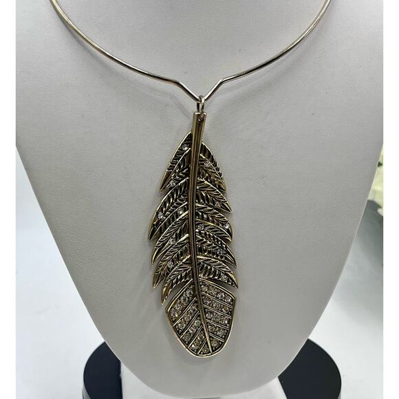 Betsey Johnson Indian Summer Lg
Pave Feather Choker Torque Gold Tone Necklace - Picture 5 of 15